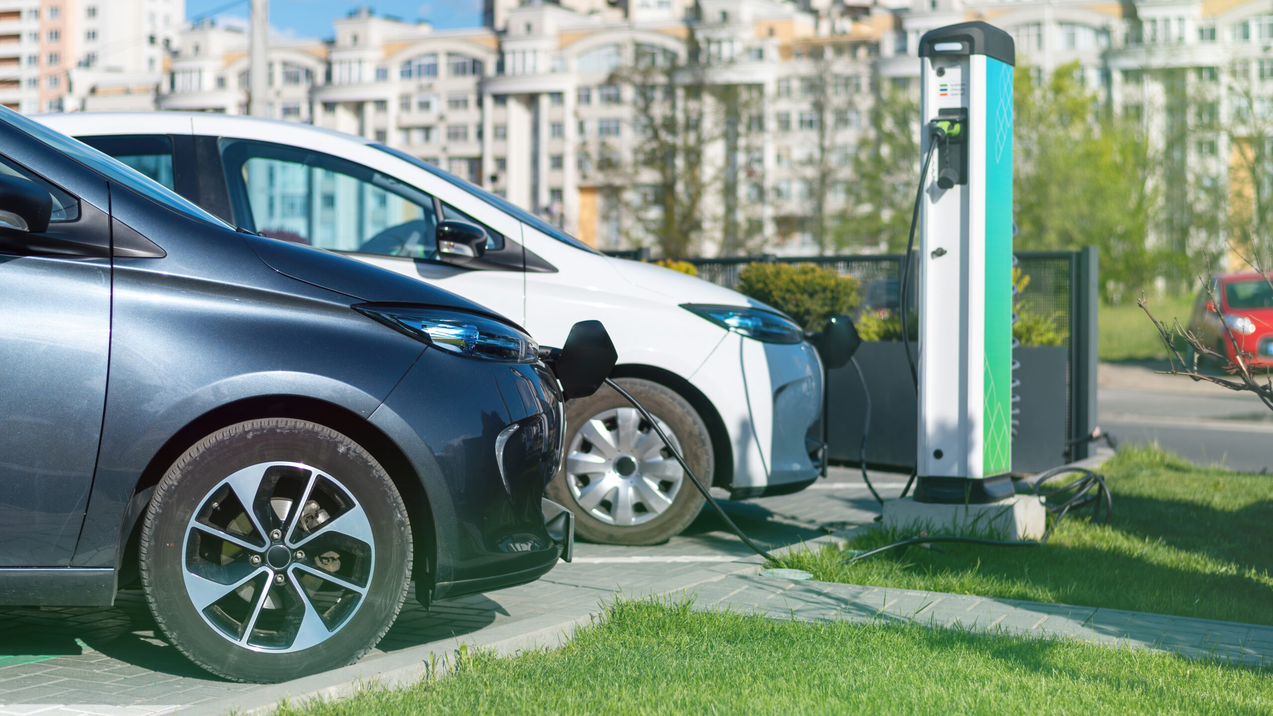 Two charging electric cars
